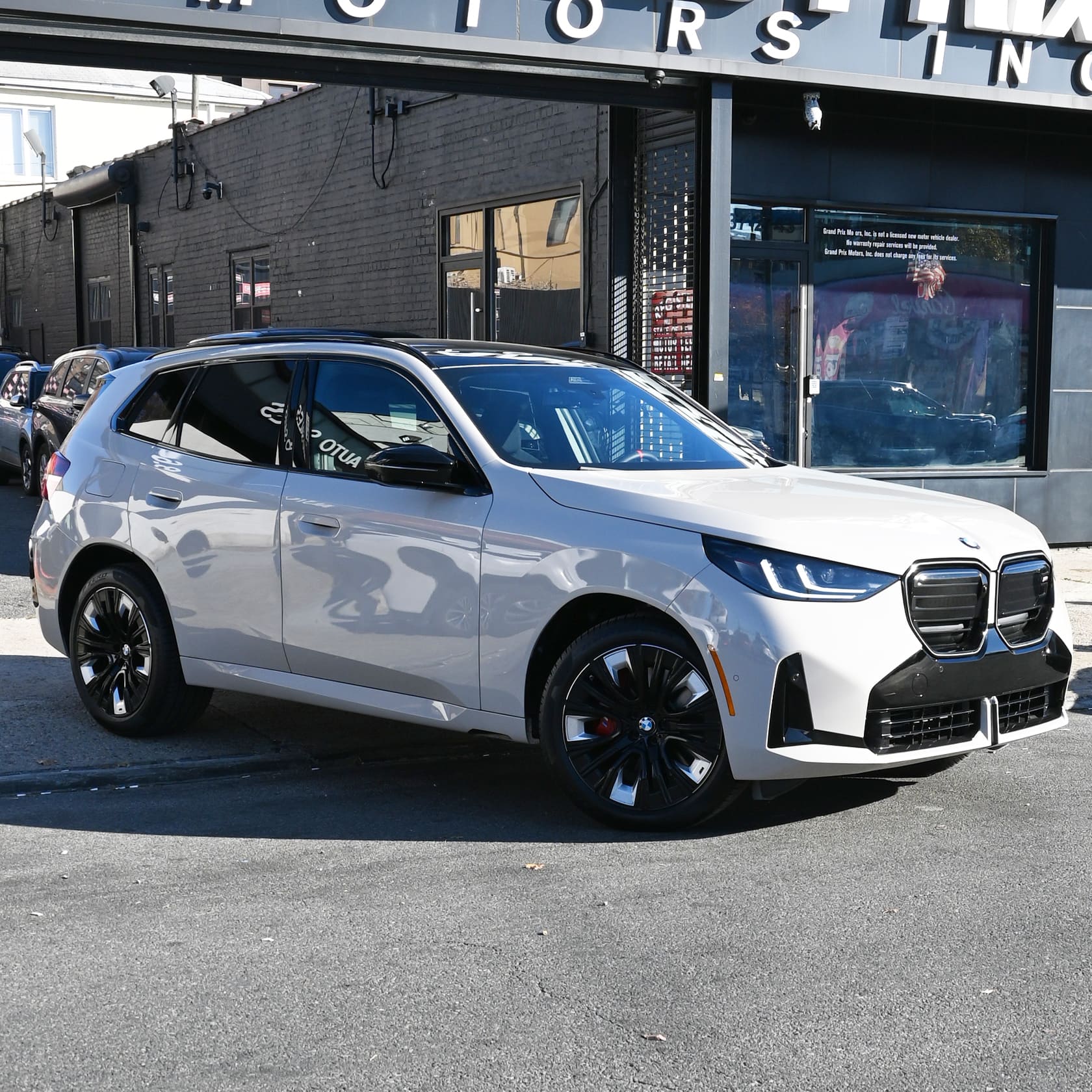White 2026 BMW X3 at the Grand Prix Motors Brooklyn lot