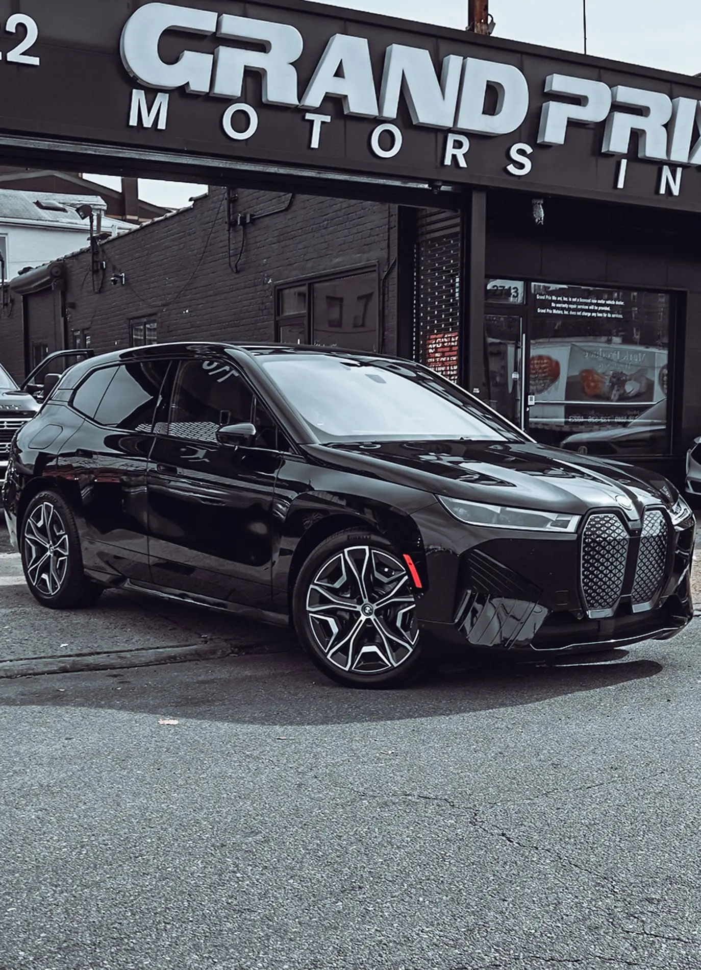 Black BMW iX electric SUV available to lease at Grand Prix Motors