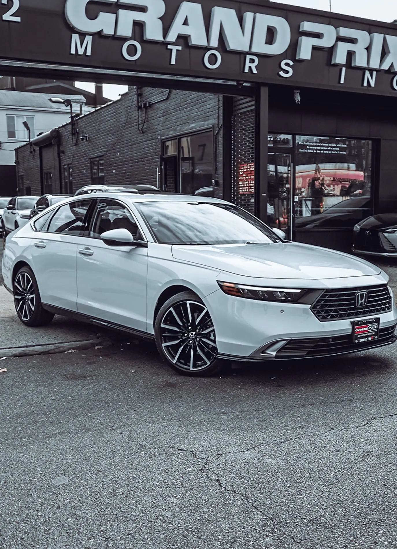 White Honda Accord sedan available to lease at Grand Prix Motors